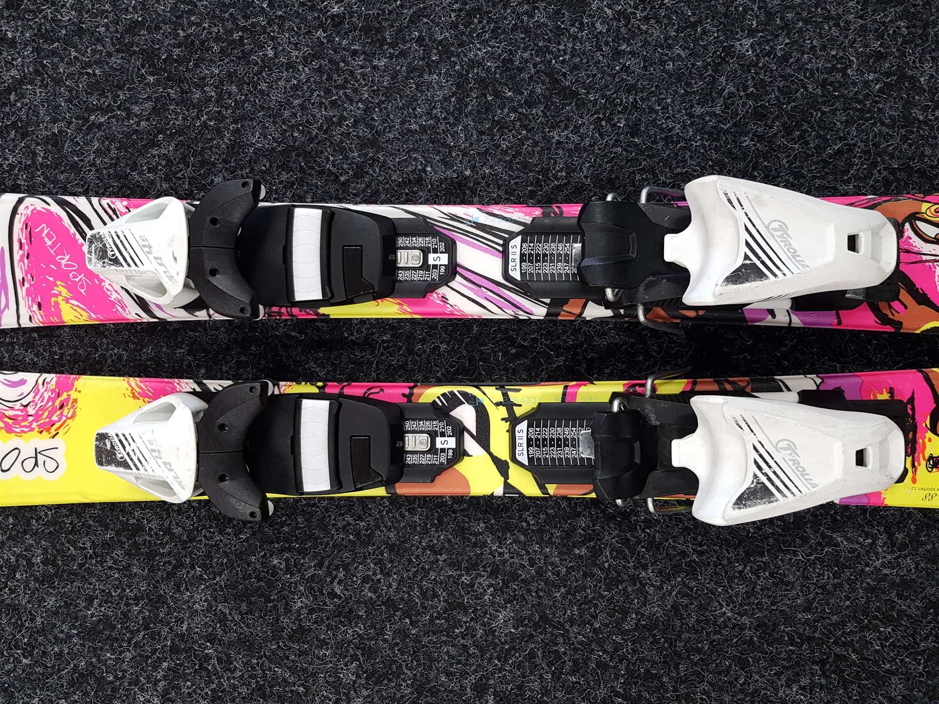 Skis enfant d'occasion SPORTEN Rocker + fixations Tyrolia SLR 4.5
