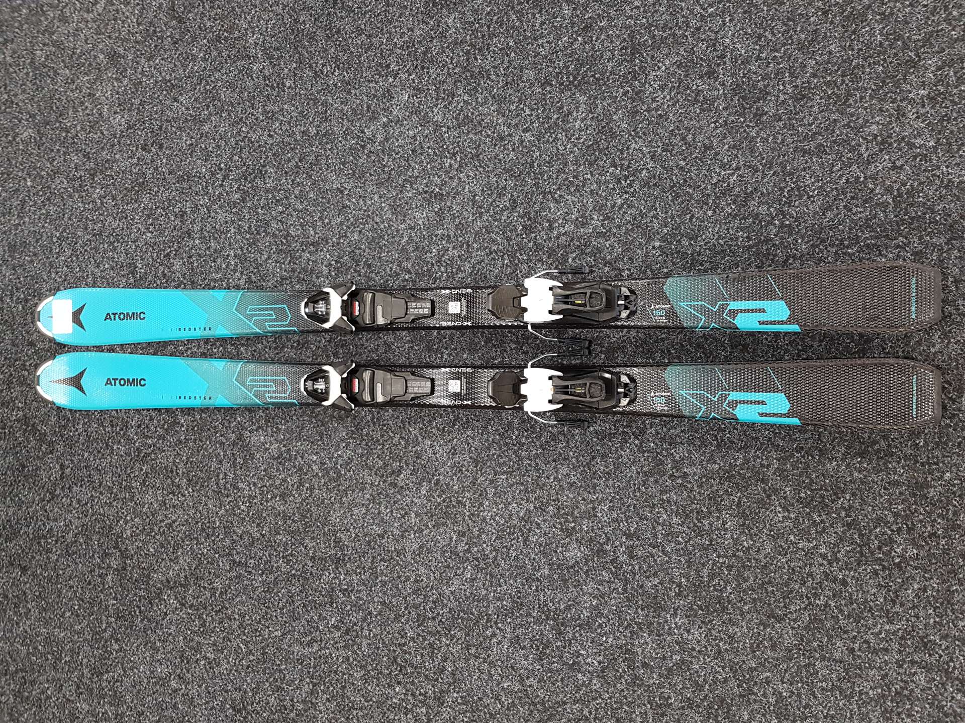 Gebrauchte ATOMIC Redster X2 Ski + Atomic L6 Bindungen