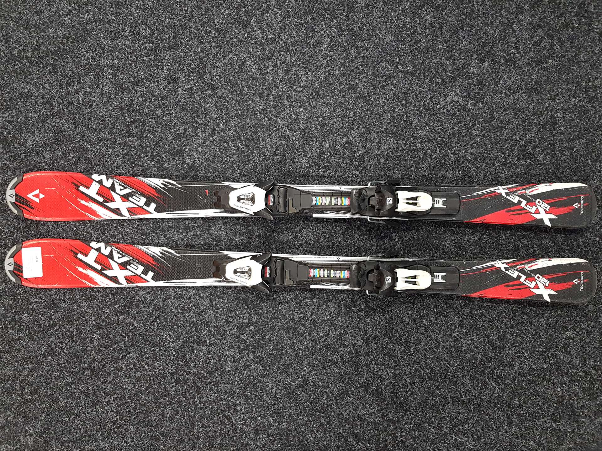 Skis enfant d'occasion TECNOPRO XT Team + fixations Salomon 4.5