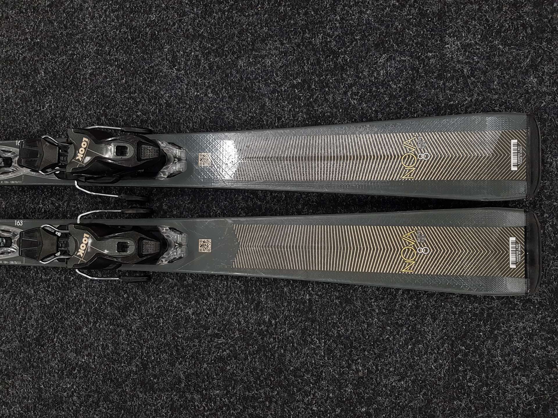 Skis ROSSIGNOL Nova 8 d'occasion + fixations Look Xpress 11