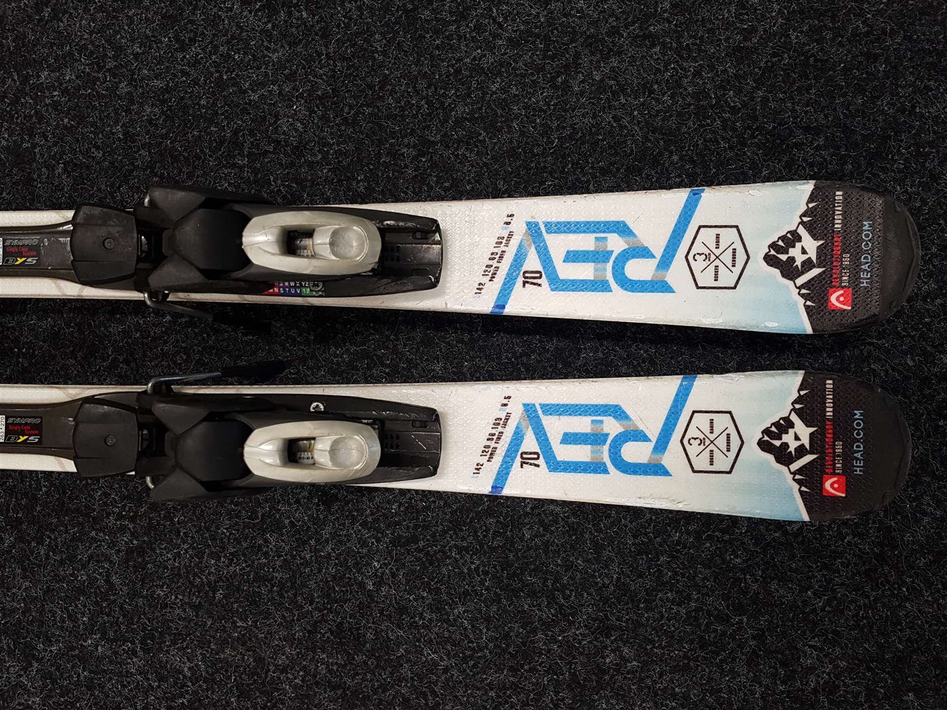 Skis HEAD REV d'occasion + fixations Tyrolia 10.0