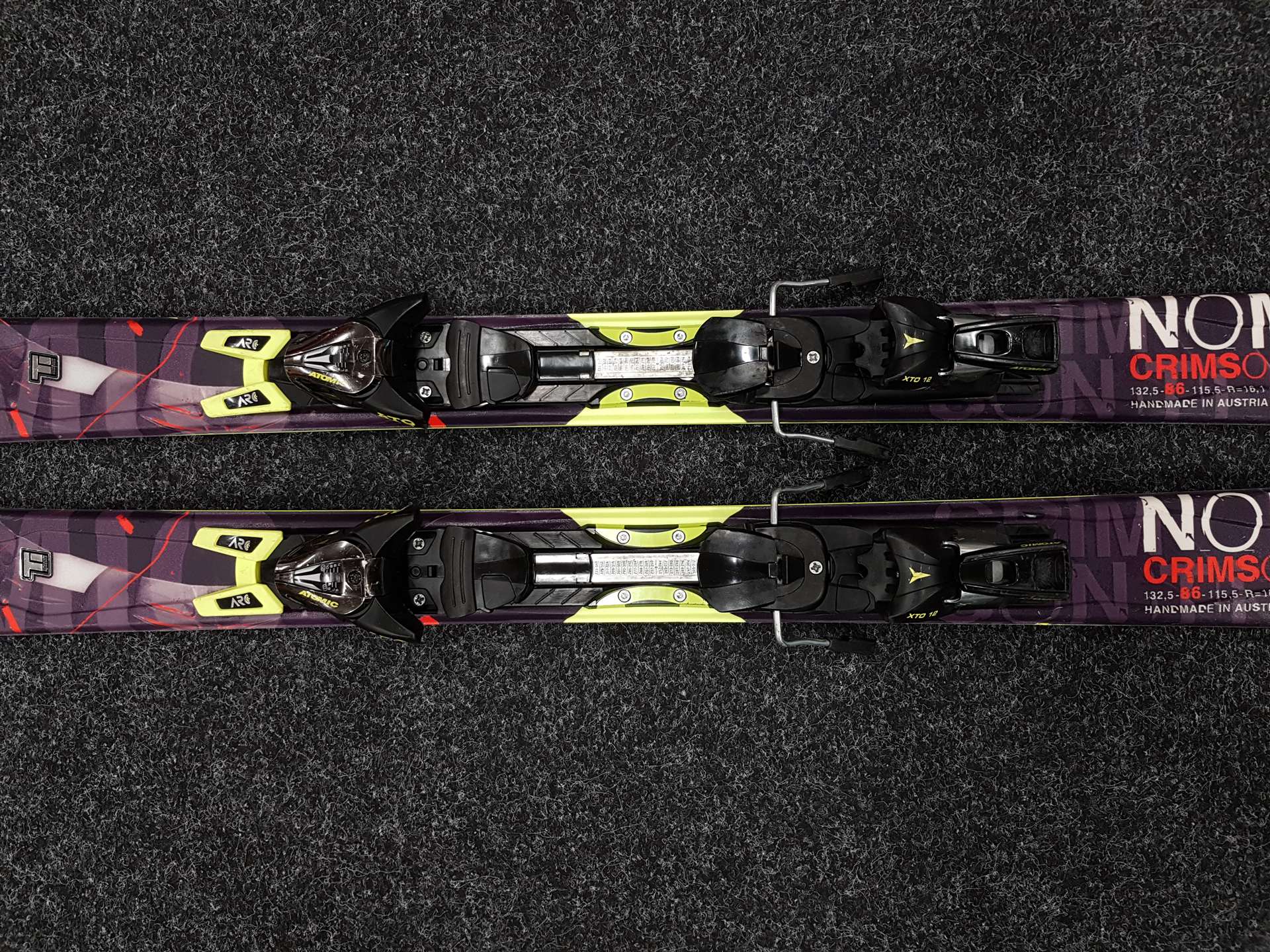 Gebrauchte ATOMIC Nomad Crimson Ti Ski + Atomic XTO 12 Bindungen