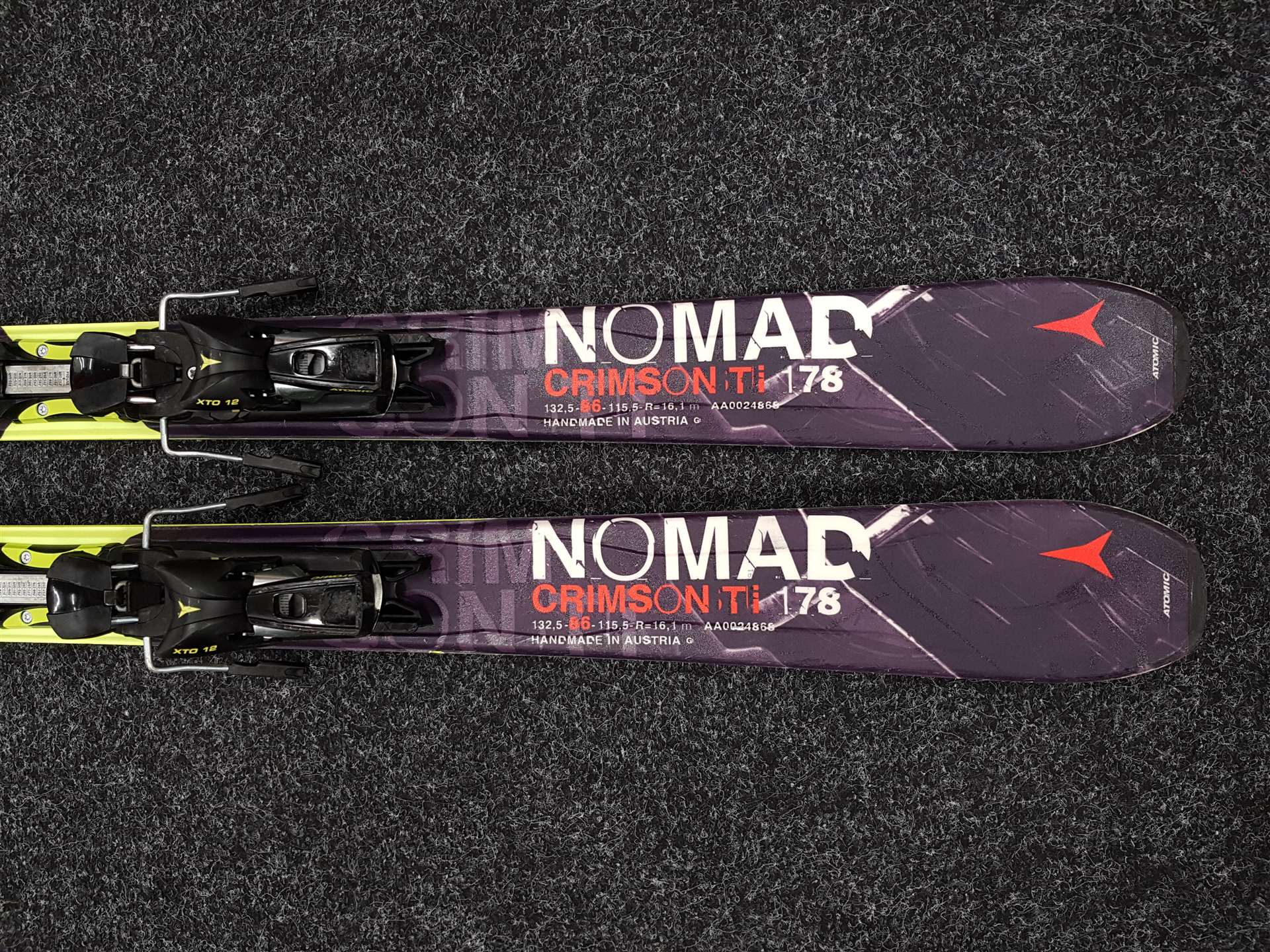 Gebrauchte ATOMIC Nomad Crimson Ti Ski + Atomic XTO 12 Bindungen