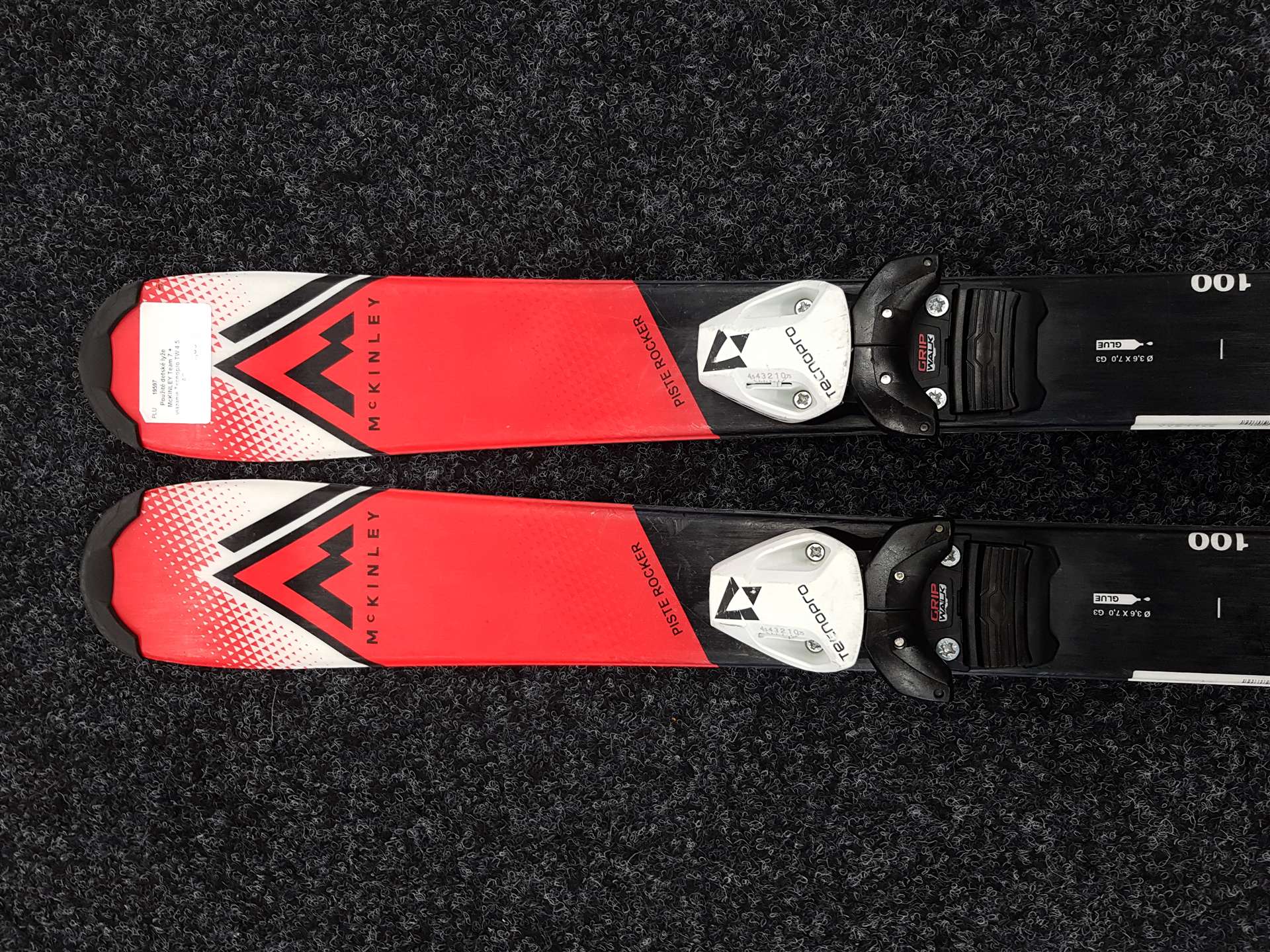 Použité dětské lyže McKINLEY Team 7 + vázání Tecnopro TW 4.5 AC
