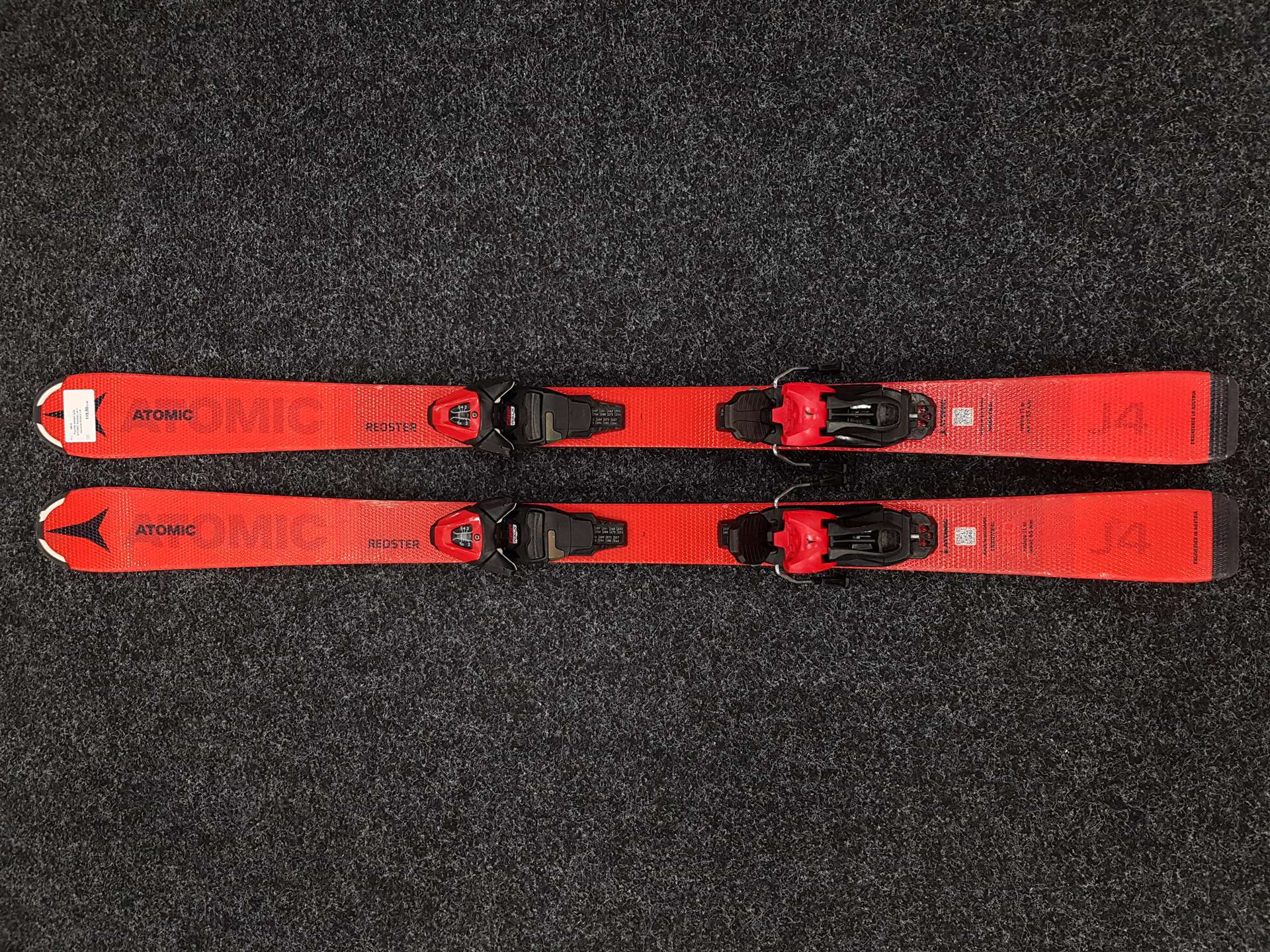 Použité dětské lyže ATOMIC Redster J4 + vázání Atomic L6