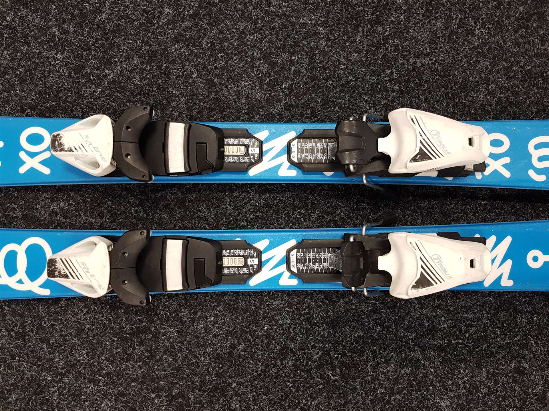 Skis enfant d'occasion SPORTEN XOXO + fixations Tyrolia SLR 4.5