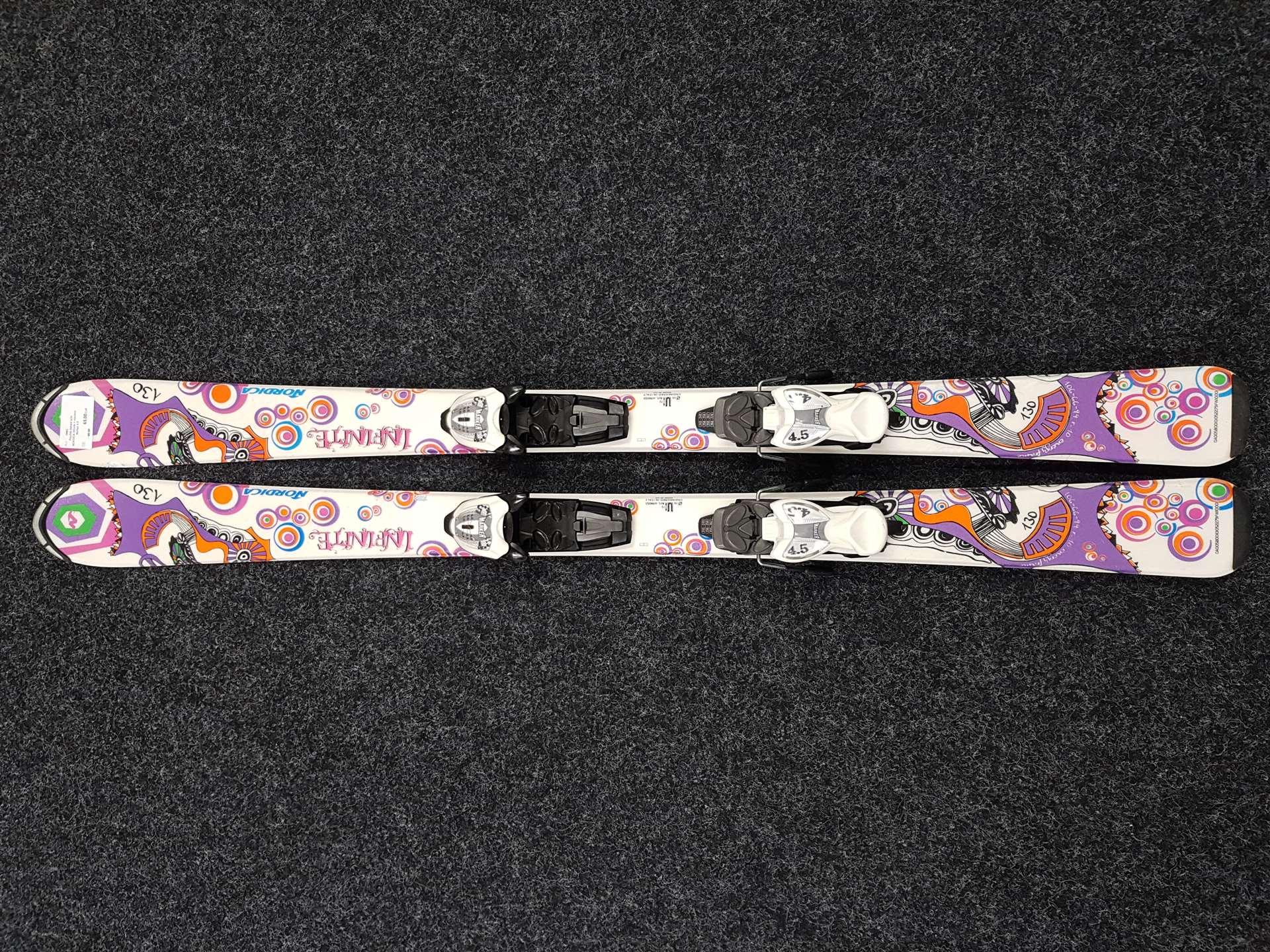 Skis enfant d'occasion NORDICA Infinite + fixations Marker 4.5