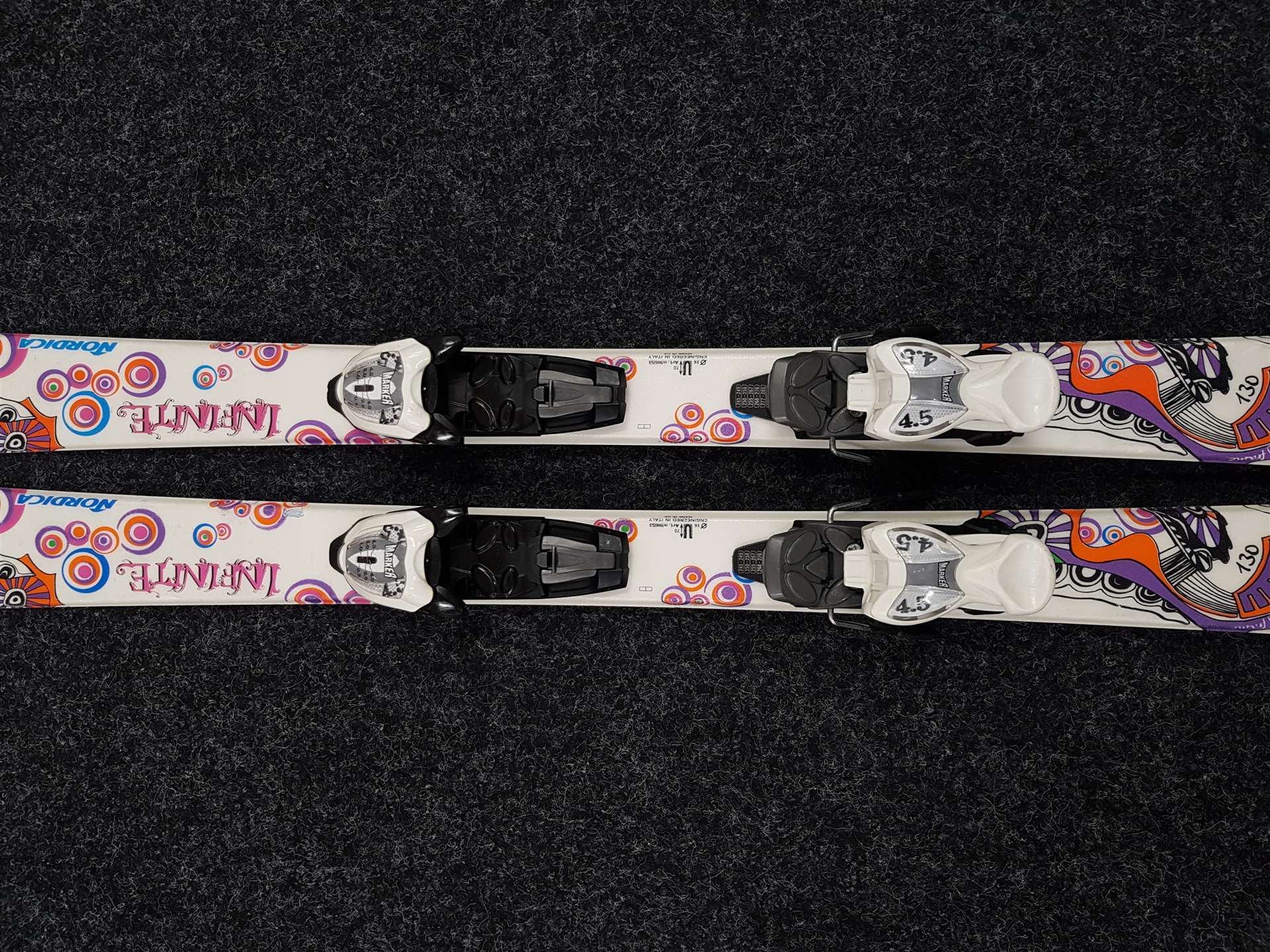 Skis enfant d'occasion NORDICA Infinite + fixations Marker 4.5