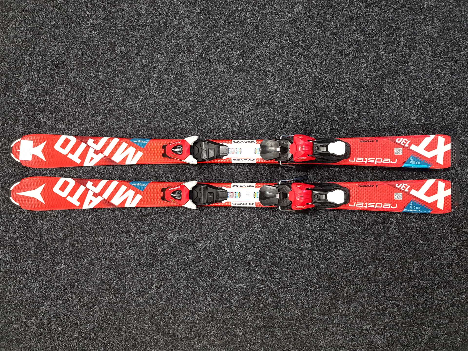 Skis enfant d'occasion ATOMIC Redster XT + fixations Atomic XTE 7