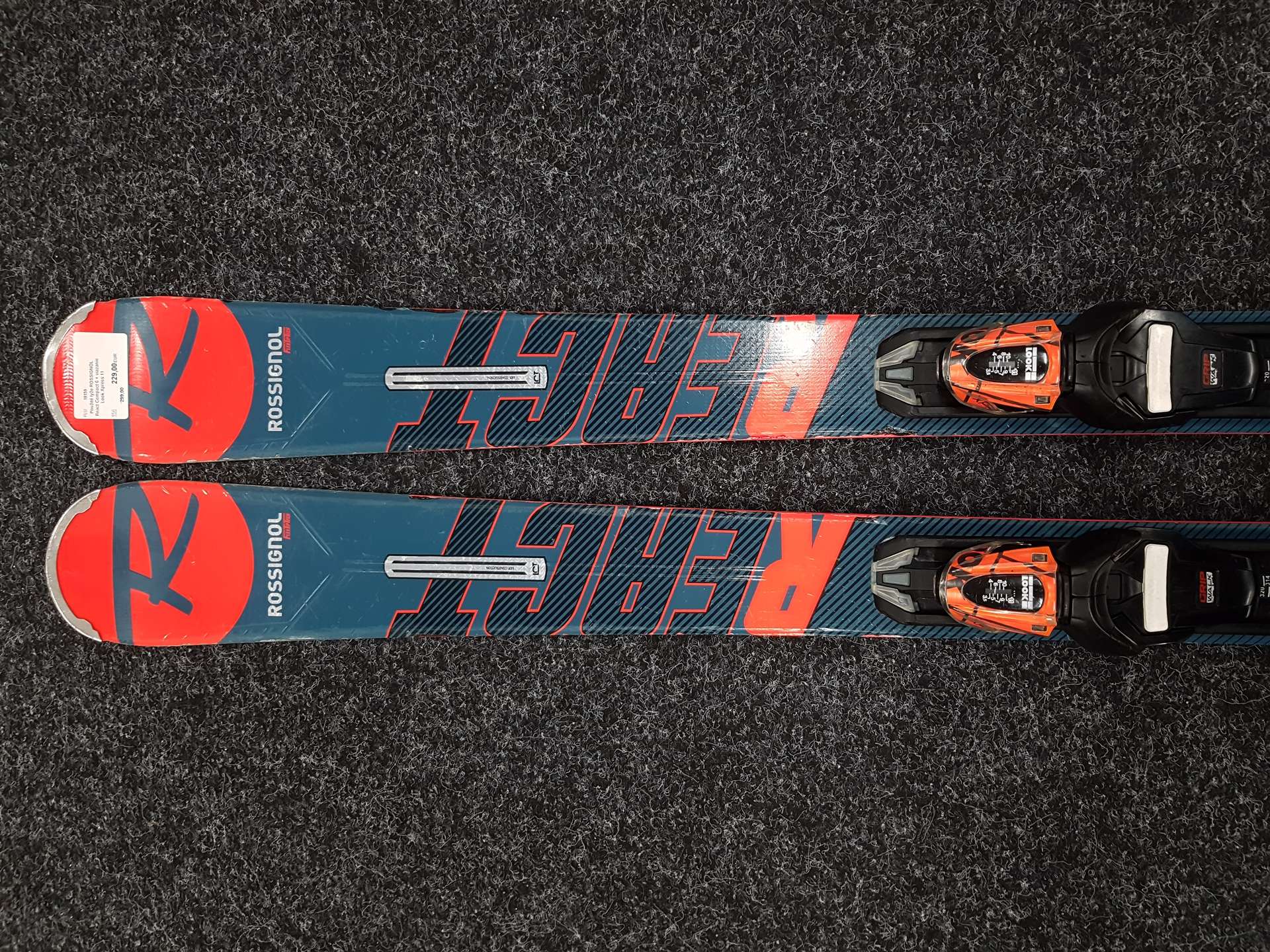 Używane narty ROSSIGNOL React Compact 6 + wiązania Look Xpress 11
