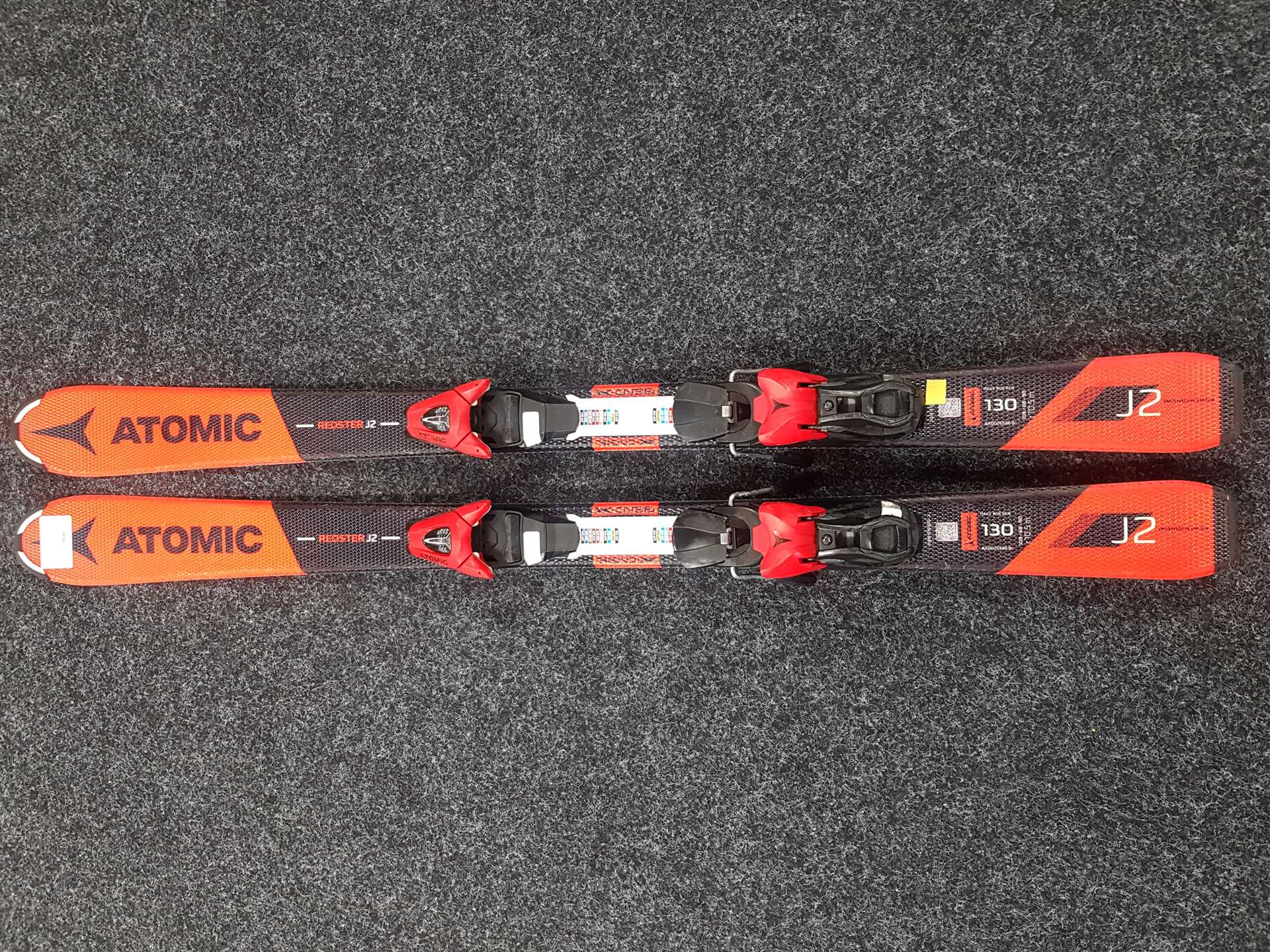 Použité detské lyže ATOMIC Redster J2 + viazanie Atomic L7