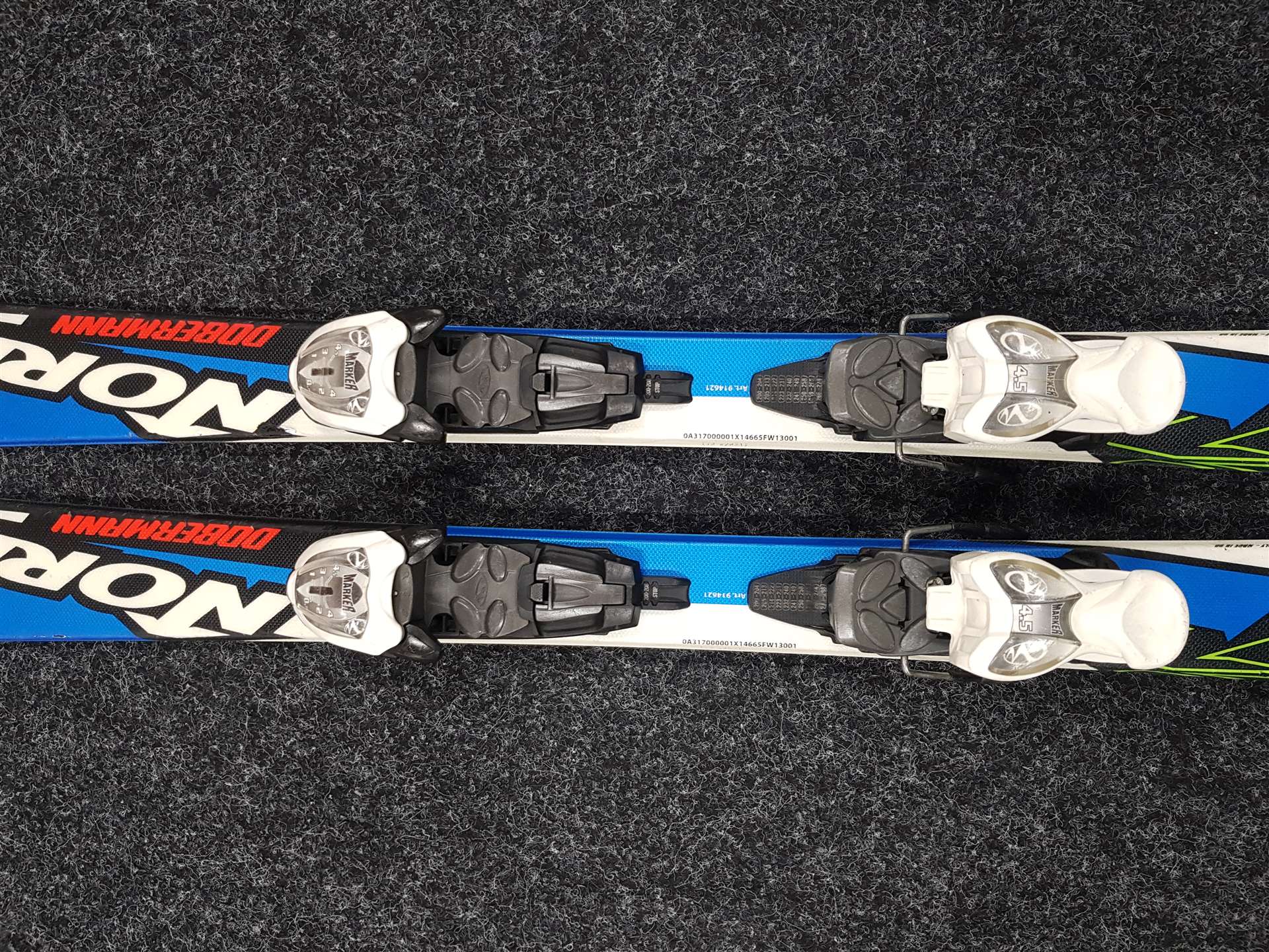 Použité detské lyže NORDICA Dobermann Team Race JR + viazanie Marker 4.5