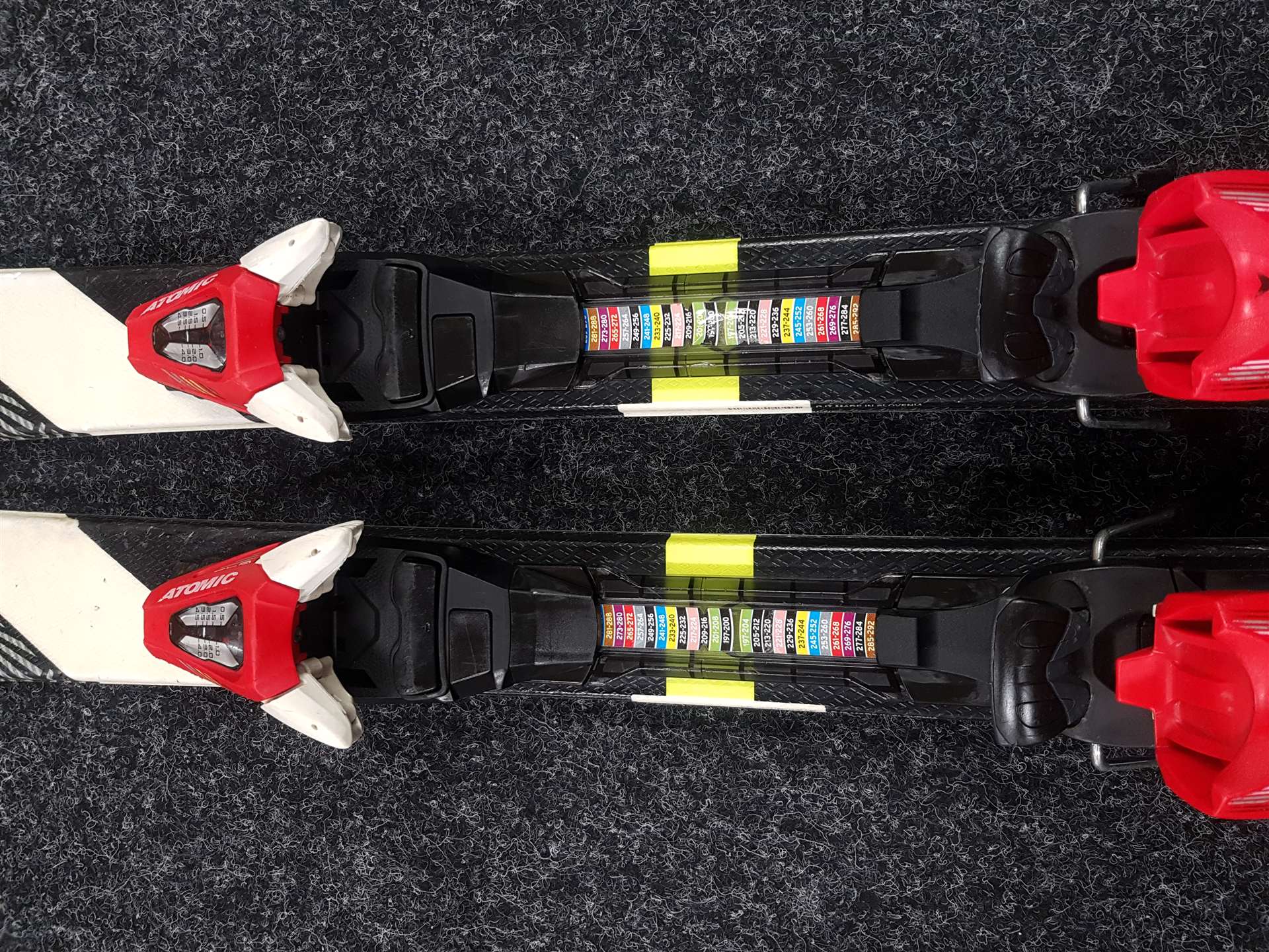 Skis enfant d'occasion TECNOPRO Team 66 + fixations Atomic 4.5