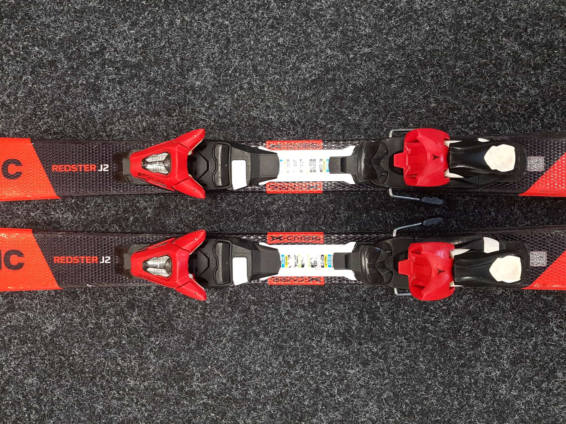 Gebrauchte Kinderski ATOMIC Redster J2 + Atomic C5 4.5 Bindungen