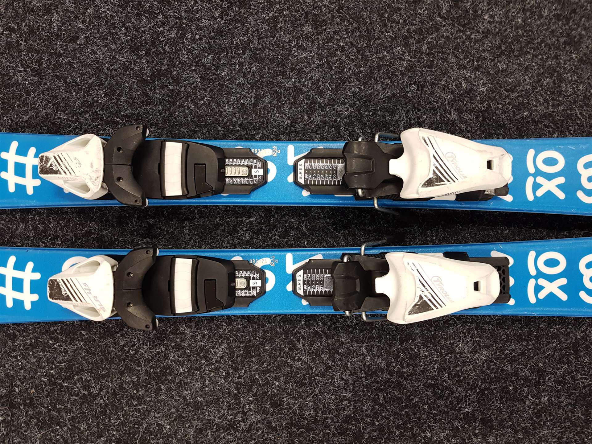 Skis enfant d'occasion SPORTEN XOXO + fixations Tyrolia SLR 4.5