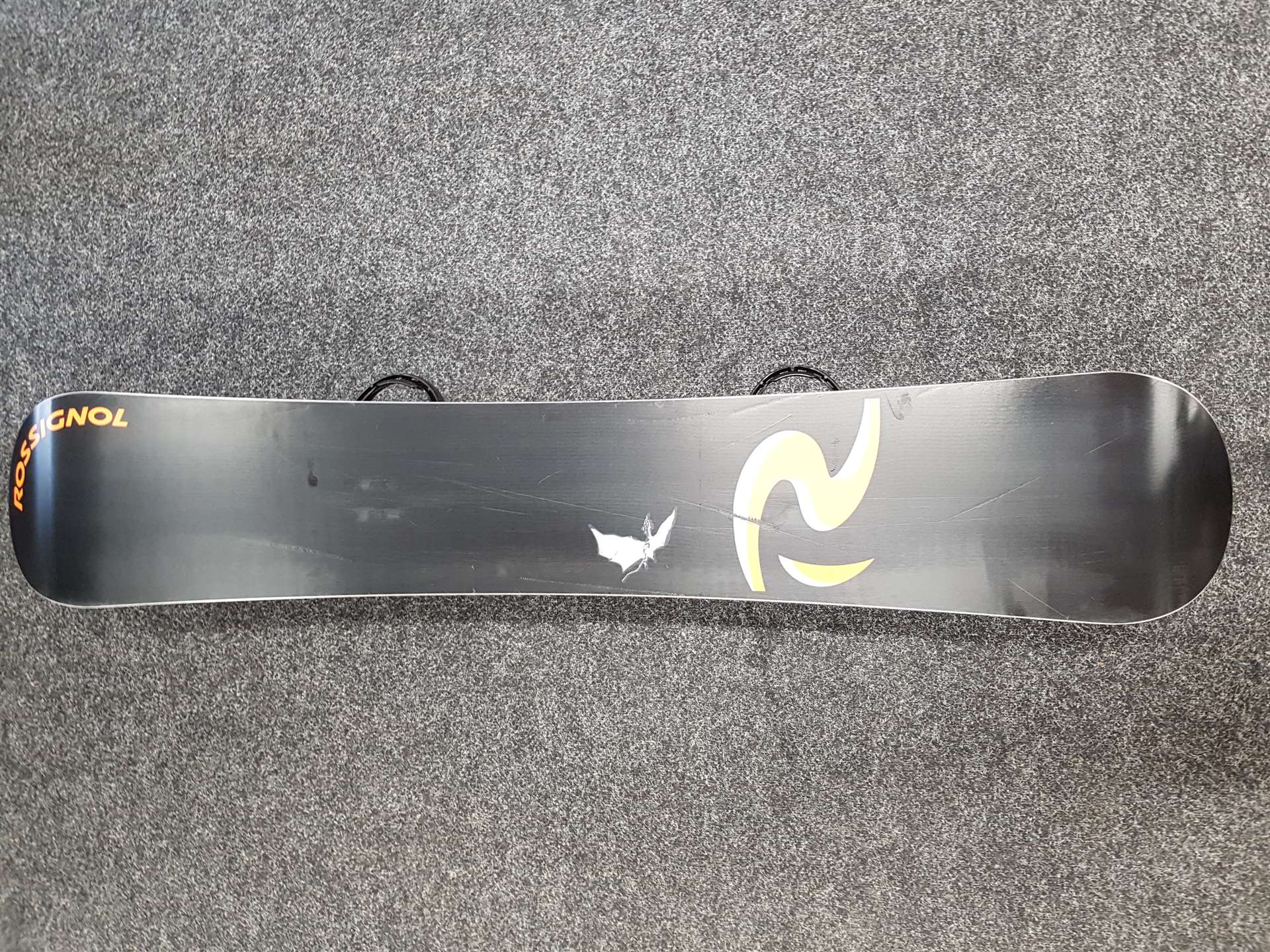 Używany snowboard Rossignol z wiązaniami Salomon L