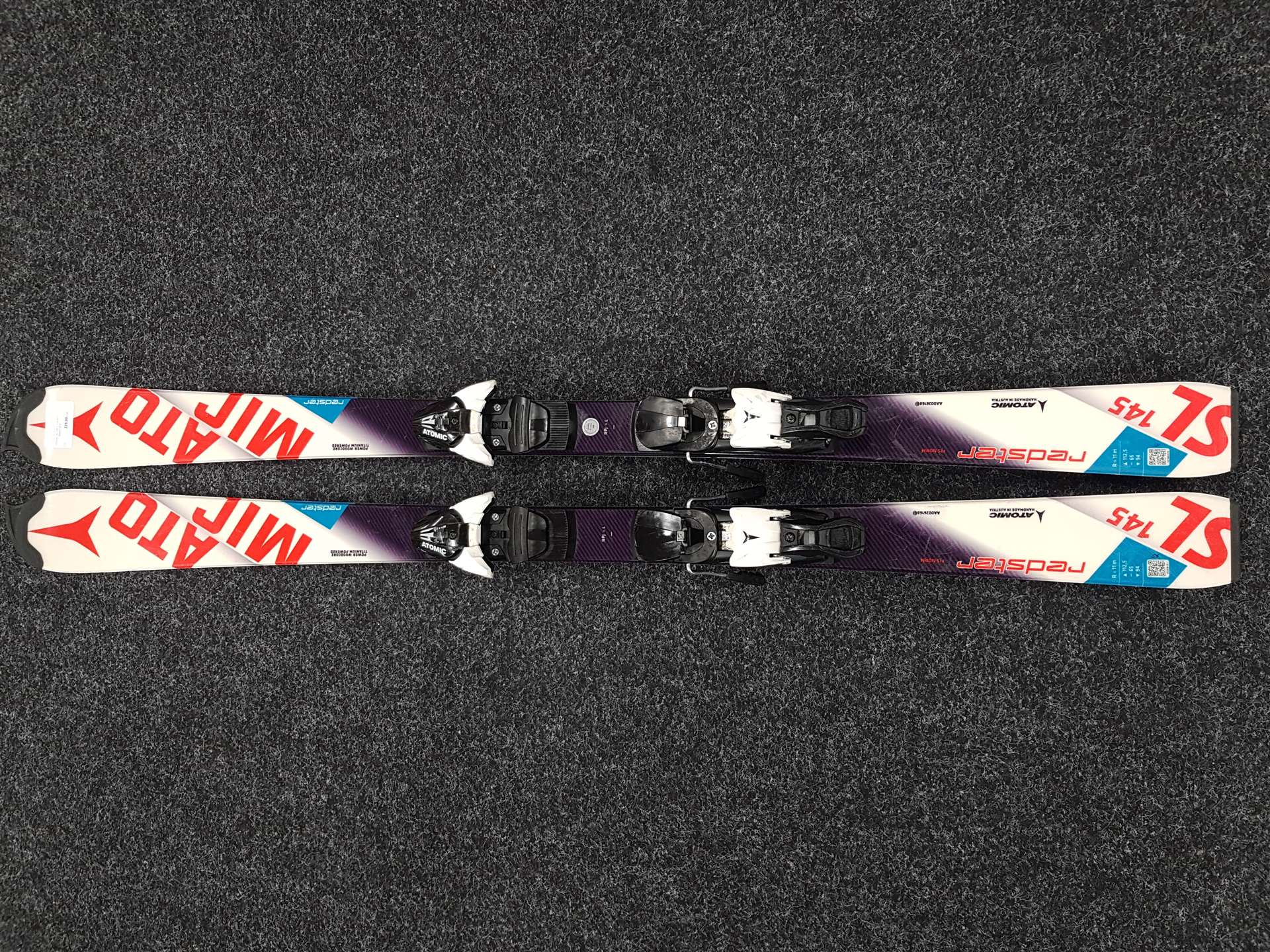 Použité lyže ATOMIC Redster SL 145 + viazanie Atomic Z12