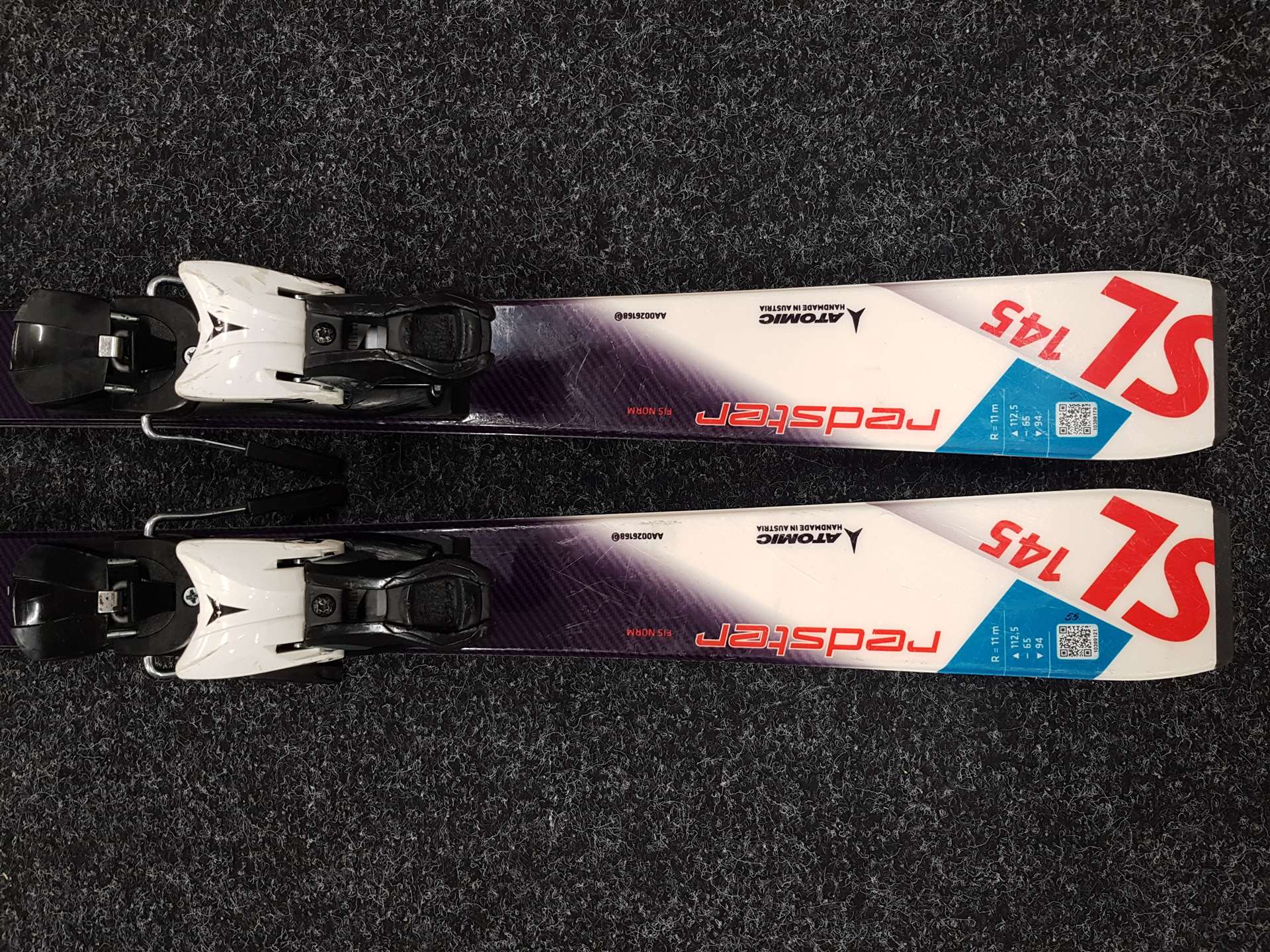Použité lyže ATOMIC Redster SL 145 + viazanie Atomic Z12
