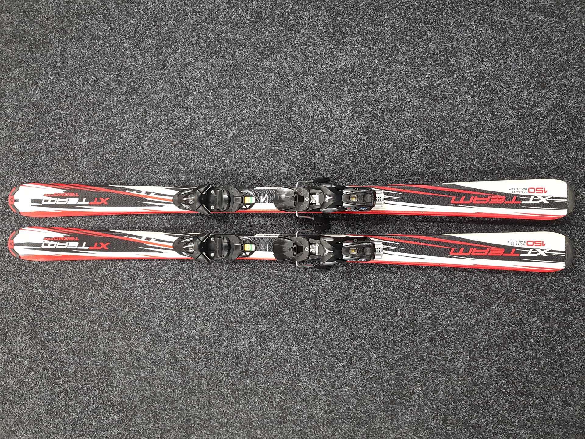 Gebrauchte TECNOPRO XT Team Ski + Atomic 7.5 Bindungen