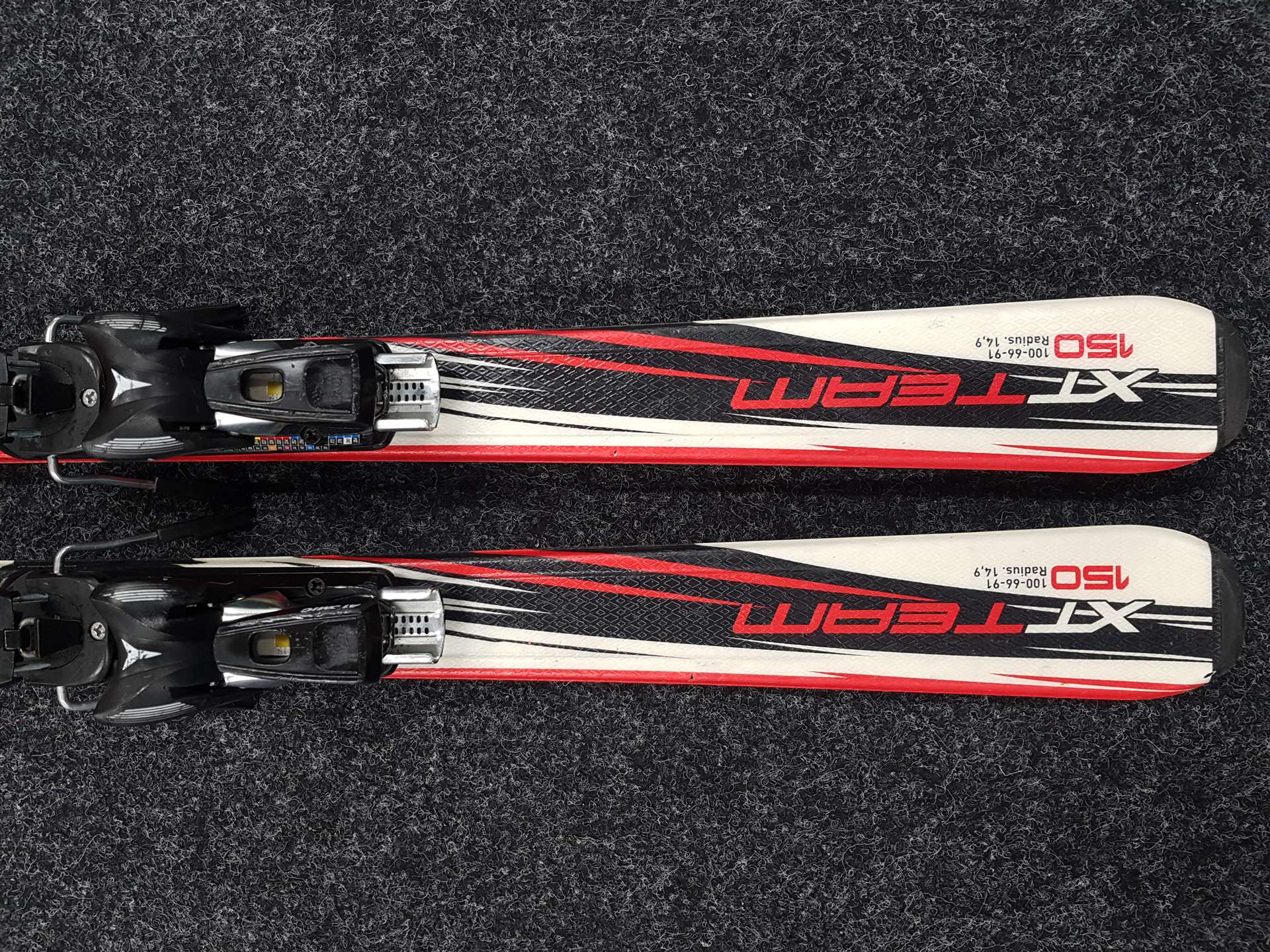 Gebrauchte TECNOPRO XT Team Ski + Atomic 7.5 Bindungen