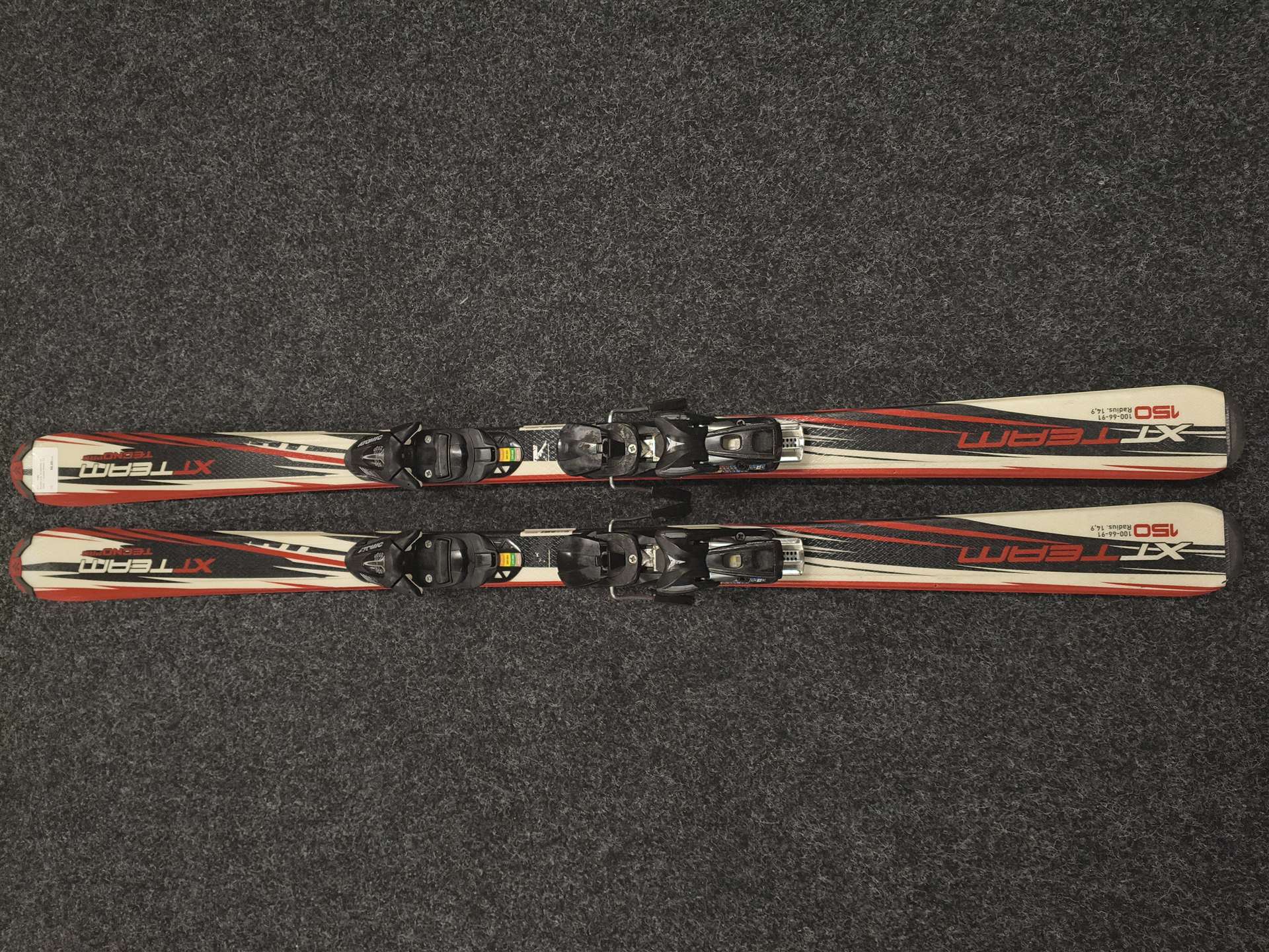 Gebrauchte TECNOPRO XT Team Ski + Atomic 7.5 Bindungen