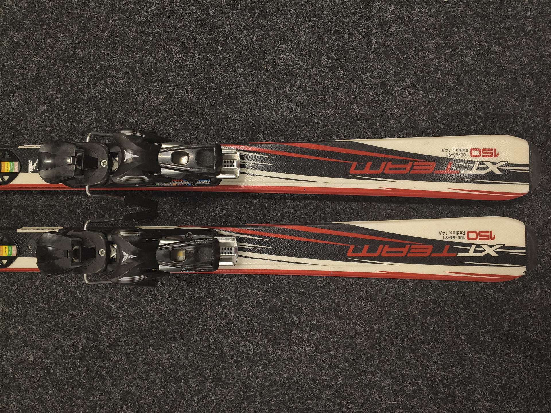 Gebrauchte TECNOPRO XT Team Ski + Atomic 7.5 Bindungen