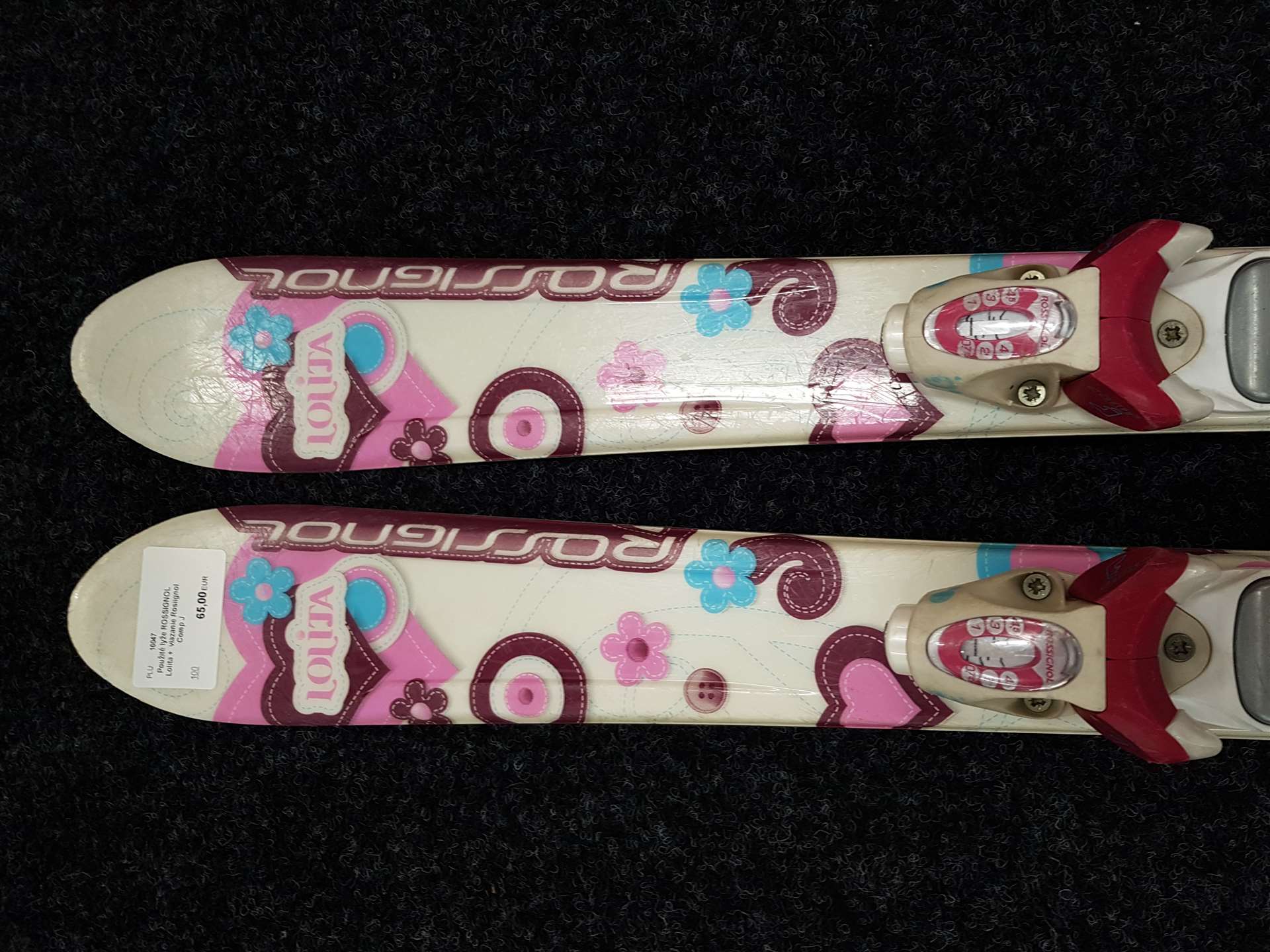 Skis ROSSIGNOL Lolita d'occasion + fixations Rosiignol Comp J