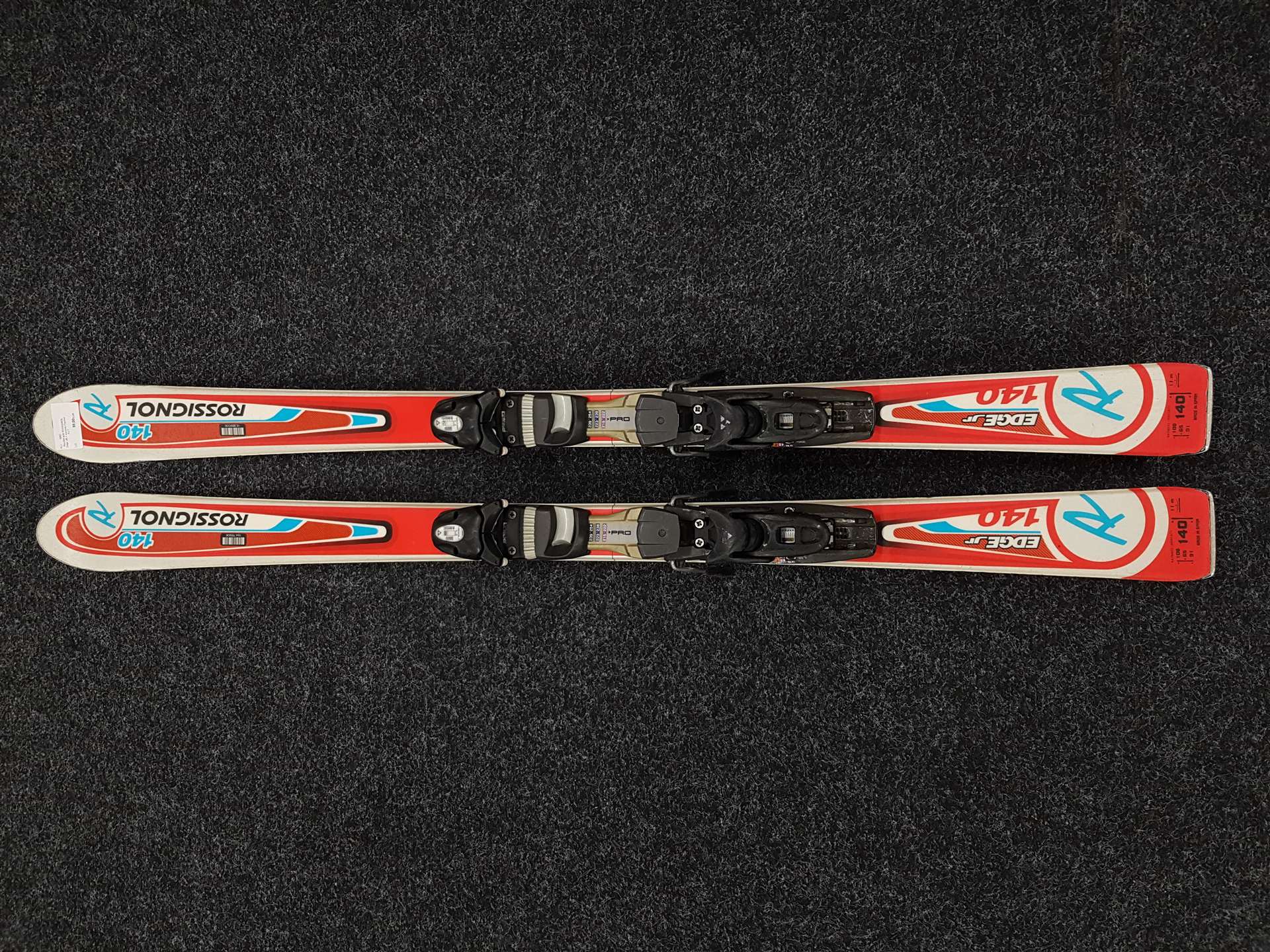Skis ROSSIGNOL Edge JR d'occasion + fixations Fischer FJ 7