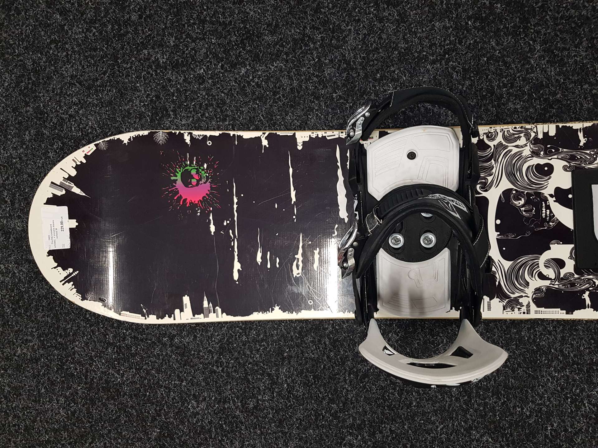 Gebrauchtes ATOMIC Snowboard + Atomic Bindungen Größe M